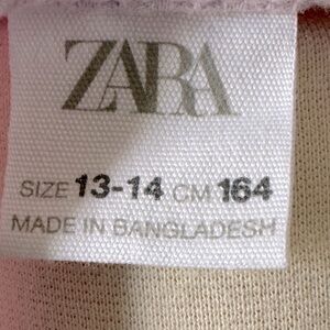 Zara.   This by s is n amazing sweater
